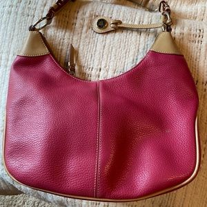 Dooney and Bourke hot pink leather handbag.